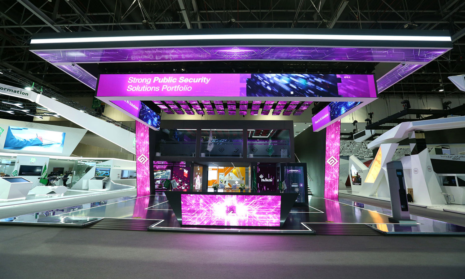Business professionals discussing solutions at a modern exhibition stand